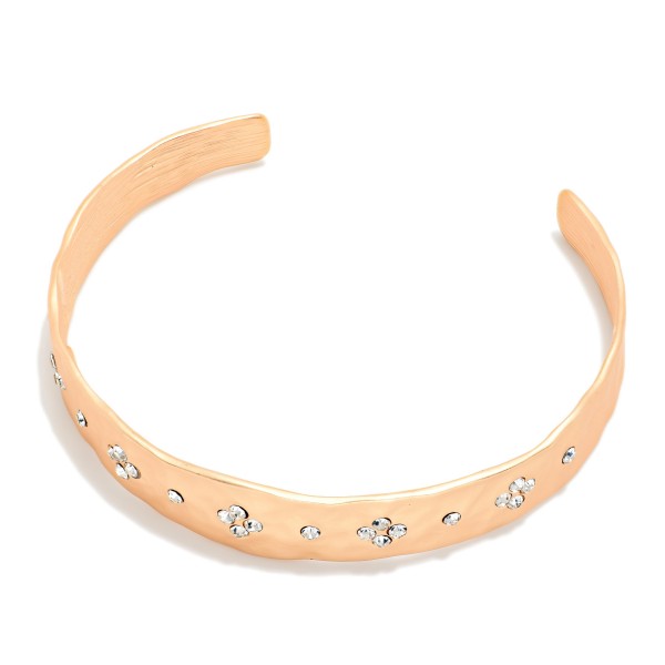 Hammered Metal Cuff Bracelet With Rhinestone Clover Details 

- Approximately 2.5" D