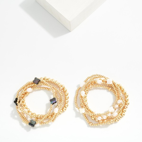 Set Of Five Metal Tone Beaded Stretch Bracelets Featuring Pearls & Clovers 

- Approximately 2.5" D