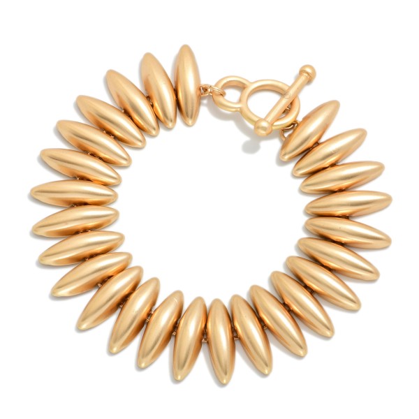 Linked Metal Tone Ovals Bracelet With Toggle Clasp

- Approximately 2.5" D