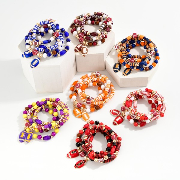 Set Of Five Game Day Beaded Stretch Bracelets Featuring Heishi Beads, Gold Tones, & Foot Ball Charms 

- Approximately 3.25" D