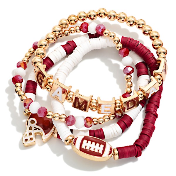 Set Of Four "Game Day" Heishi Beaded Stretch Bracelet Featuring Football Charms 

- Approximately 3.5" D 