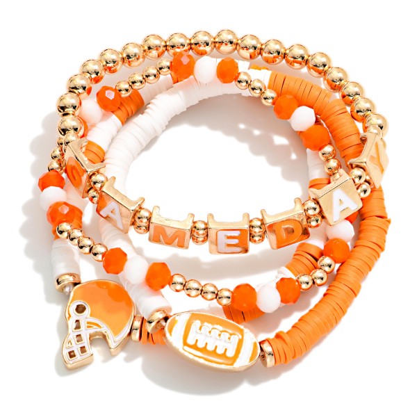 Set Of Four "Game Day" Heishi Beaded Stretch Bracelet Featuring Football Charms 

- Approximately 3.5" D 