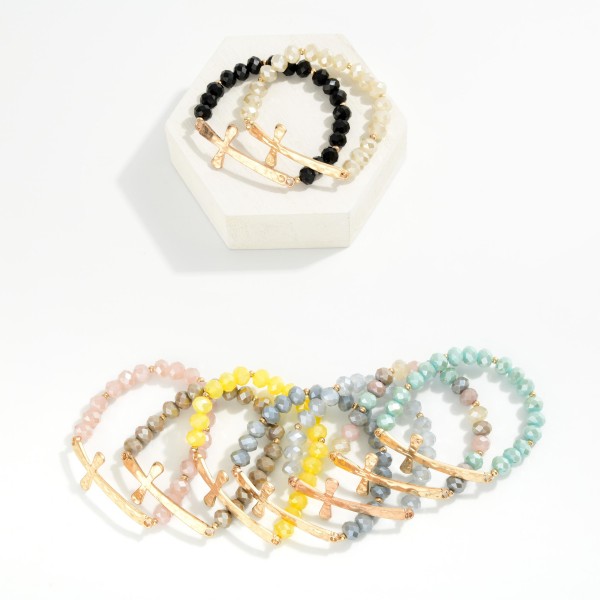 Faceted Bead Beaded Stretch Bracelet Feating Hammered Metal East West Cross

- Approximately 2.5" D
