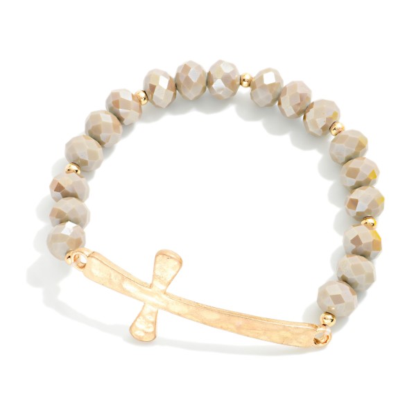 Faceted Bead Beaded Stretch Bracelet Feating Hammered Metal East West Cross

- Approximately 2.5" D
