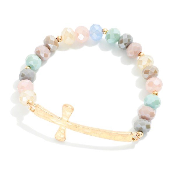 Faceted Bead Beaded Stretch Bracelet Feating Hammered Metal East West Cross

- Approximately 2.5" D
