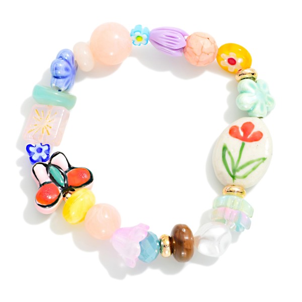 Multi Bead Beaded Stretch Bracelet Featuring Flowers & Porcelain Beads

- Approximately 2.5" D 