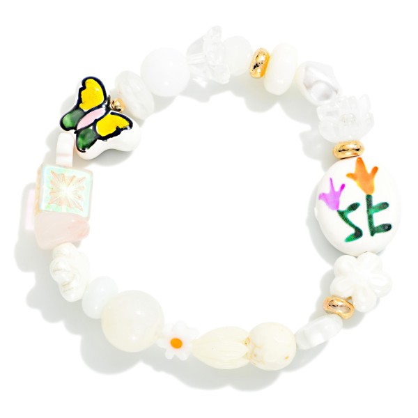 Multi Bead Beaded Stretch Bracelet Featuring Flowers & Porcelain Beads

- Approximately 2.5" D 