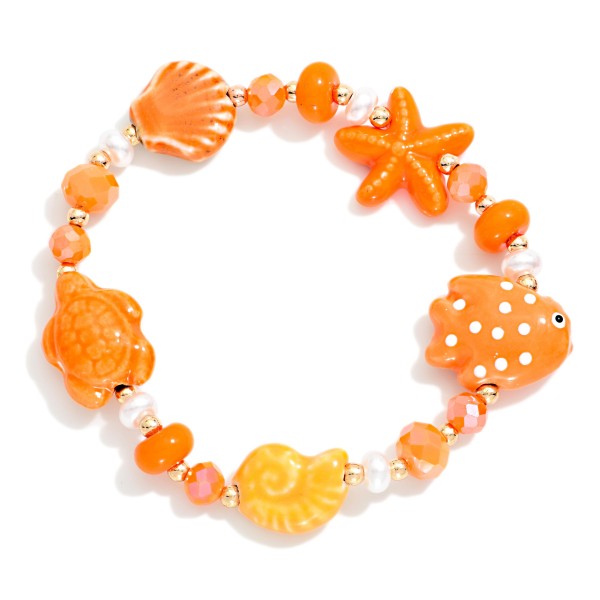 Beaded Stretch Bracelet Featuring Nautical Porcelain Beads & Pearls

- Approximately 2.5" D