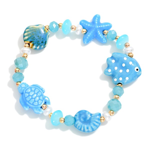 Beaded Stretch Bracelet Featuring Nautical Porcelain Beads & Pearls

- Approximately 2.5" D