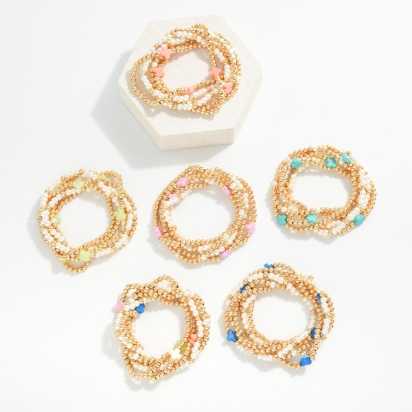 Set Of Six Beaded Stretch Bracelets Featuring Metal Tones, Pearl, Plus Cross Stations 

- Approximately 2.5" D