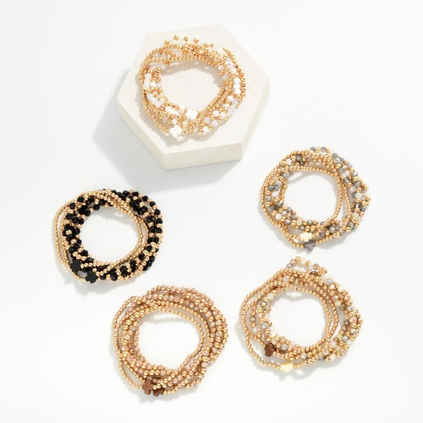 Set Of Six Beaded Stretch Bracelets Featuring Metal Tones, Faceted Beads, & Plus Cross Stations 

- Approximately 2.5" D