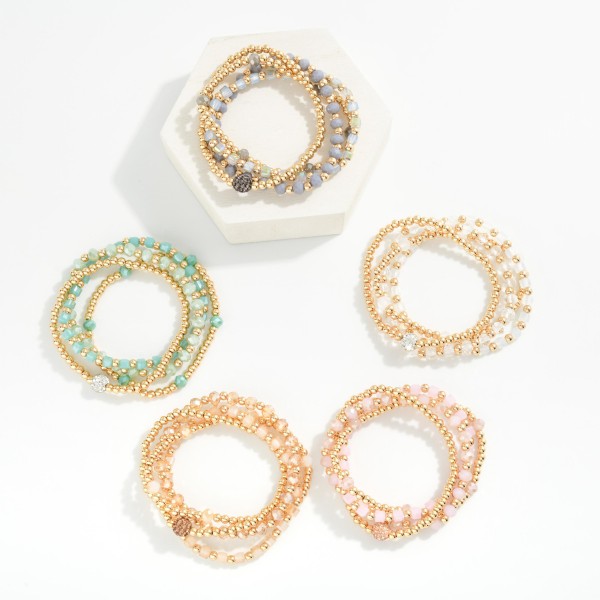 Set Of Four Beaded Stretch Bracelets Featuring Metal Tones & Faceted Beads

- Approximately 2.5" D