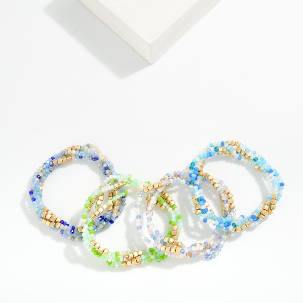 Set OF Four Beaded Stretch Bracelets Featuring Faceted & Square Metal Tone Beads 

- Approximately 2.5" D