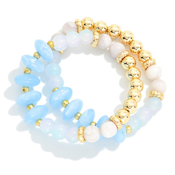 Set Of Two Beaded Stretch Bracelets Featuring Metal Tones, Marbled Disks, & Glitter Beads 

- Approximately 2.5" D
