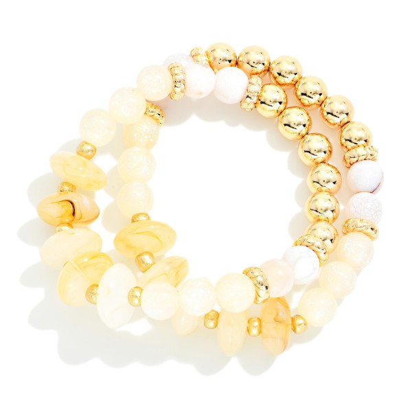 Set Of Two Beaded Stretch Bracelets Featuring Metal Tones, Marbled Disks, & Glitter Beads 

- Approximately 2.5" D