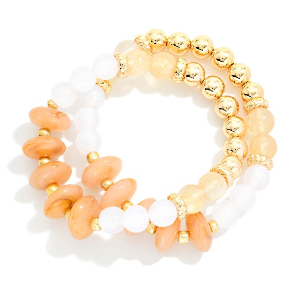 Set Of Two Beaded Stretch Bracelets Featuring Metal Tones, Marbled Disks, & Glitter Beads 

- Approximately 2.5" D