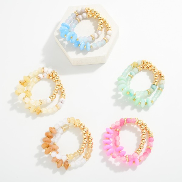 Set Of Two Beaded Stretch Bracelets Featuring Metal Tones, Marbled Disks, & Glitter Beads 

- Approximately 2.5" D