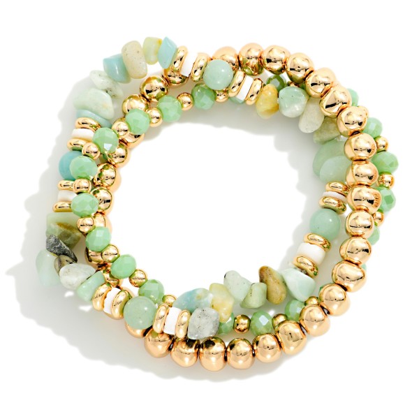 Set Of Three Beaded Stretch Bracelets Featuring Metal Tones, Faceted Beads, & Stone 

- Approximately 2.5" D