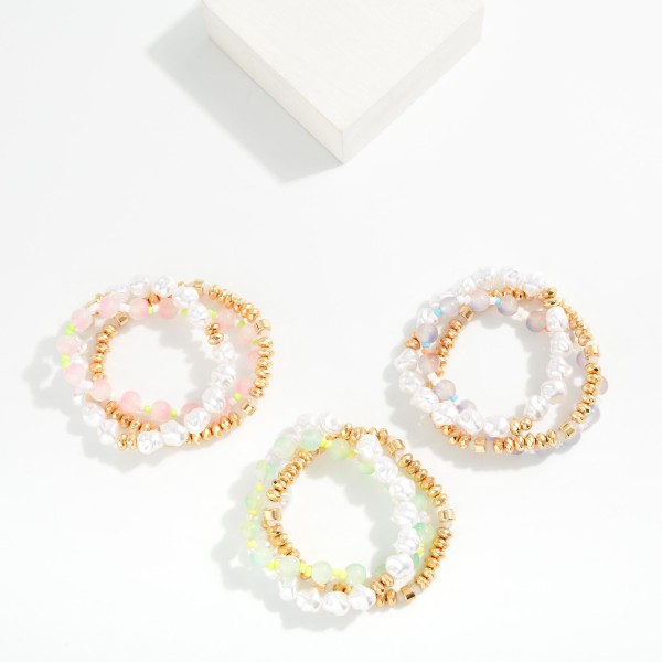 Set Of Three Beaded Stretch Bracelet Featuring Gold Tones, Pearls, And Marble Beads 

- Approximately 2.5" D 