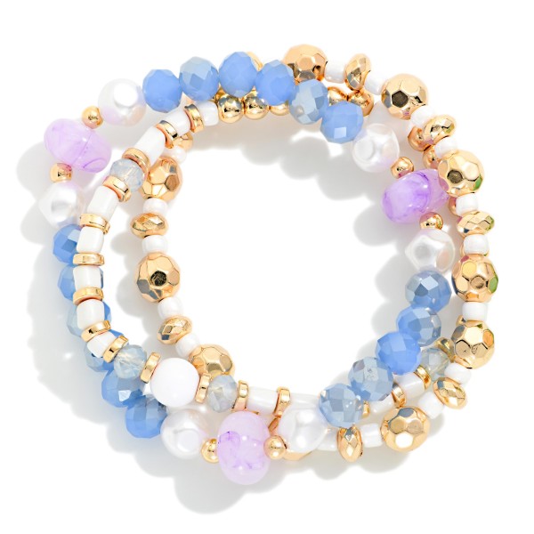 Set Of Three Beaded Stretch Bracelets Featuring Pearls, Metal Tones, & Faceted Beads

- Approximately 2.5" D