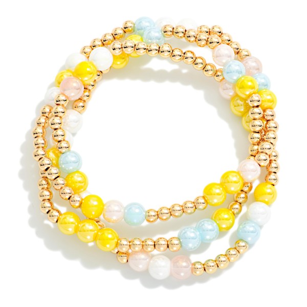 Set Of Three Iridescent & Metal Tone Bead Beaded Stretch Bracelets

- Approximately 2.5" D 