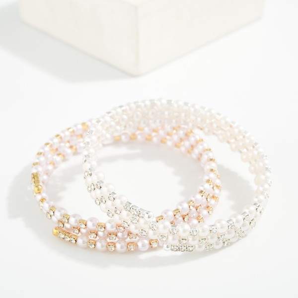 Metal Tone Memory Wire Beaded Bracelet Featuring Pearls And Rhinestones 

- Approximately 2.5" L 