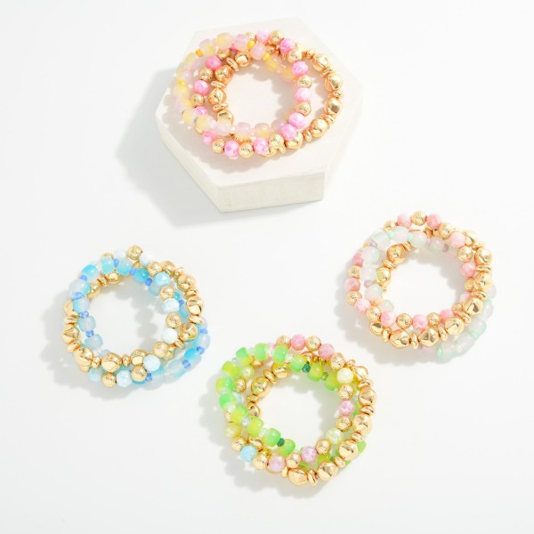 Set Of Three Beaded Stretch Bracelets Featuring Metal Tones, Ombre Beads, & Faceted Beads 

- Approximately 2.5" D