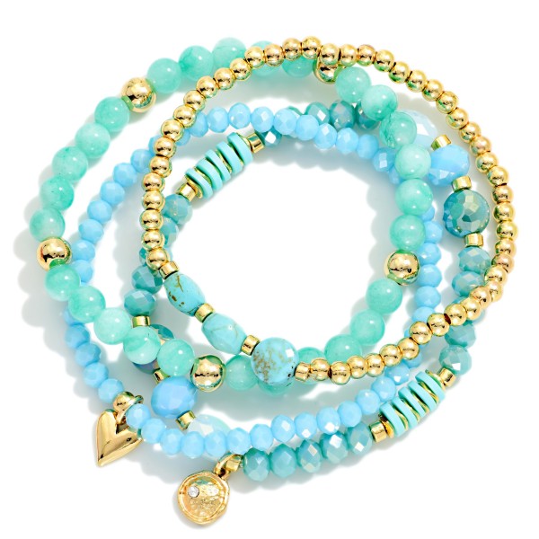 Set Of Three Beaded Stretch Bracelets Featuring Faceted Beads, Disk Beads, & Metal Tones 

- Approximately 2.5" D
