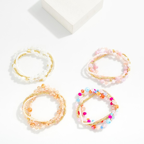 Set Of Four Beaded Stretch Bracelets Featuring Faceted Beads, Heishi Beads, & Metal Tones 

- Approximately 3" D
