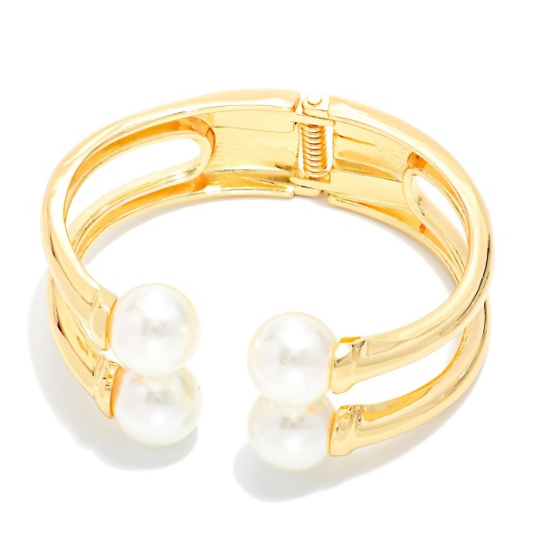 Layered Metal Hinged Bangle Bracelet Featuring Pearl Details 

- Approximately 2.5" D
