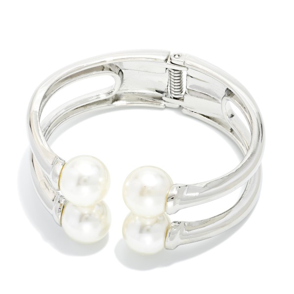 Layered Metal Hinged Bangle Bracelet Featuring Pearl Details 

- Approximately 2.5" D