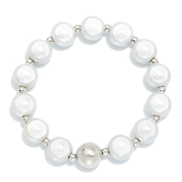 Translucent Bead Beaded Stretch Bracelet With Textured Metal Bead Detail 

- Approximately 2.5" D

 