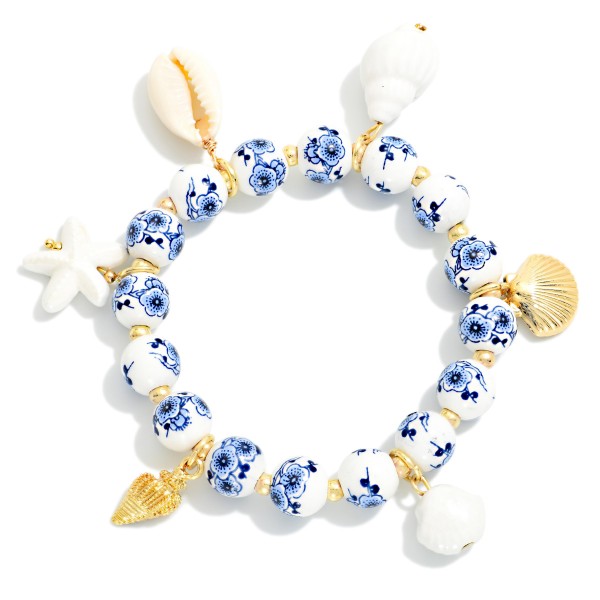 Chinoiserie Bead Beaded Stretch Bracelet Featuring Porcelain & Metal Tone Beach Charms

- APproximately 2.5" D  