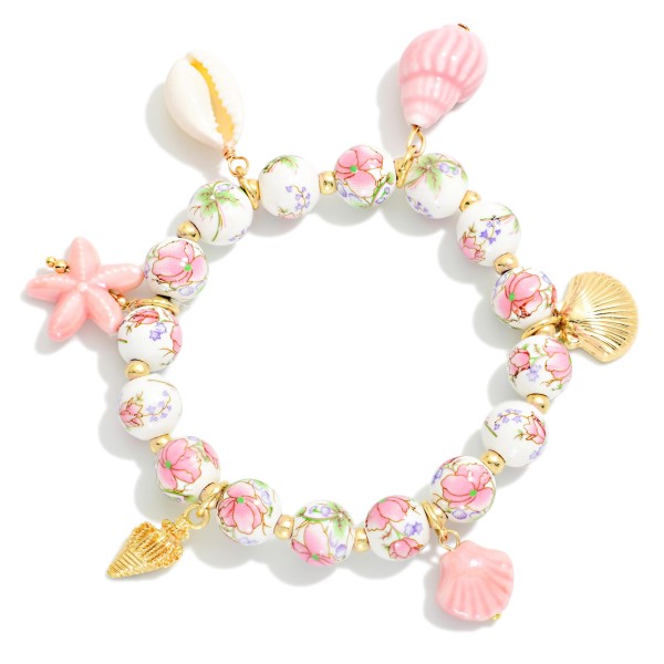 Chinoiserie Bead Beaded Stretch Bracelet Featuring Porcelain & Metal Tone Beach Charms

- APproximately 2.5" D  