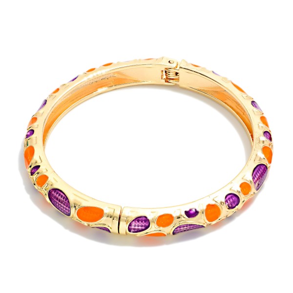 Metal Bangle Hinged Bracelet With Marbled Oval Enamel Detail

- Approximately 2.5" D 