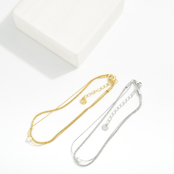 Layered Metal Tone Chain Link Anklet Featuring Pearl 

- Approximately 3.05" D
- Stainless Steel
- Water & Tarnish Resistant 
- Hypoallergenic 