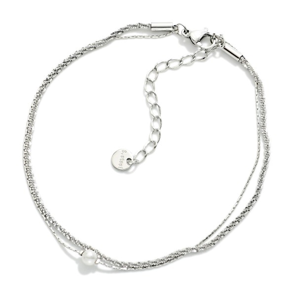 Layered Metal Tone Chain Link Anklet Featuring Pearl 

- Approximately 3.05" D
- Stainless Steel
- Water & Tarnish Resistant 
- Hypoallergenic 