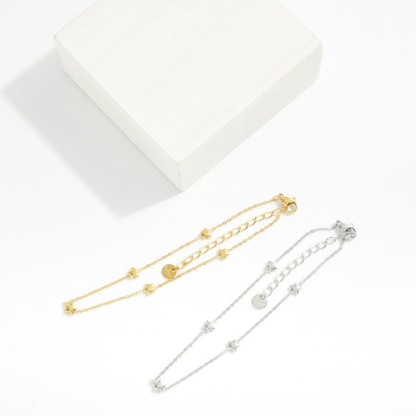 Metal Tone Chain Link Anklet Featuring Star Stations 

- Approximately 3.05" D
- Stainless Steel
- Water & Tarnish Resistant 
- Hypoallergenic 