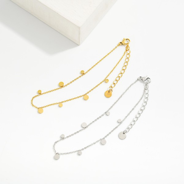Chain Link Anklet Featuring Metal Tone Circle Charms 

- Stainless Steel
- Approximately 4" D
- Extender 1" L
