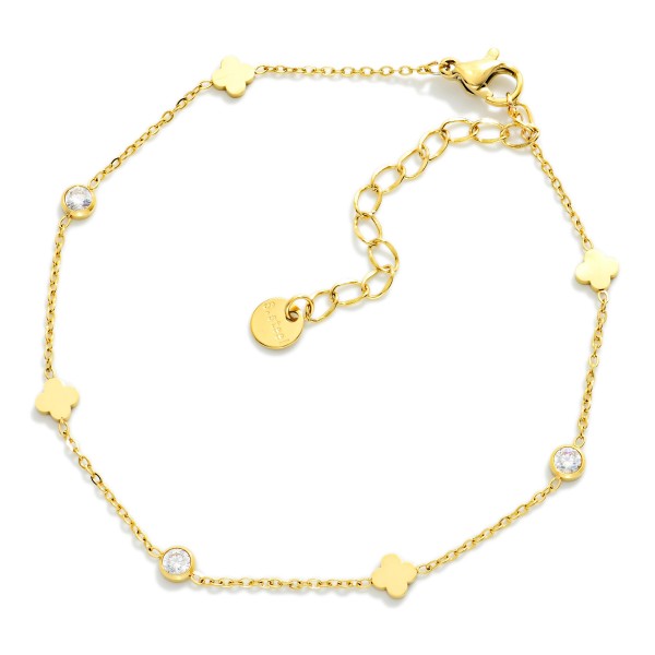 Chain Link Anklet Featuring Metal Tone Circle & Clover Charms 

- Stainless Steel
- Approximately 4" D
- Extender 1" L