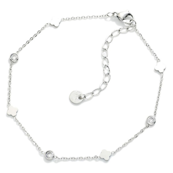 Chain Link Anklet Featuring Metal Tone Circle & Clover Charms 

- Stainless Steel
- Approximately 4" D
- Extender 1" L