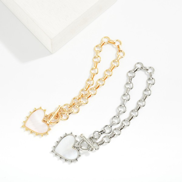 Chain Link Bracelet Featuring Pearlescent Heart & Toggle Clasp

- Approximately 3" D