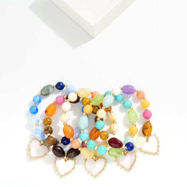 Marbled Acetate Bead Beaded Stretch Bracelet Featuring Pearlescent Heart Charm 

- Approximately 3" D