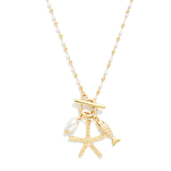 Linked Metal Bead & Pearl Necklace Featuring Metal Tone Starfish & Fish Pendant 

- Approximately 16" L