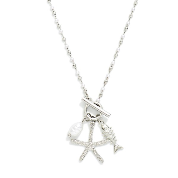 Linked Metal Bead & Pearl Necklace Featuring Metal Tone Starfish & Fish Pendant 

- Approximately 16" L