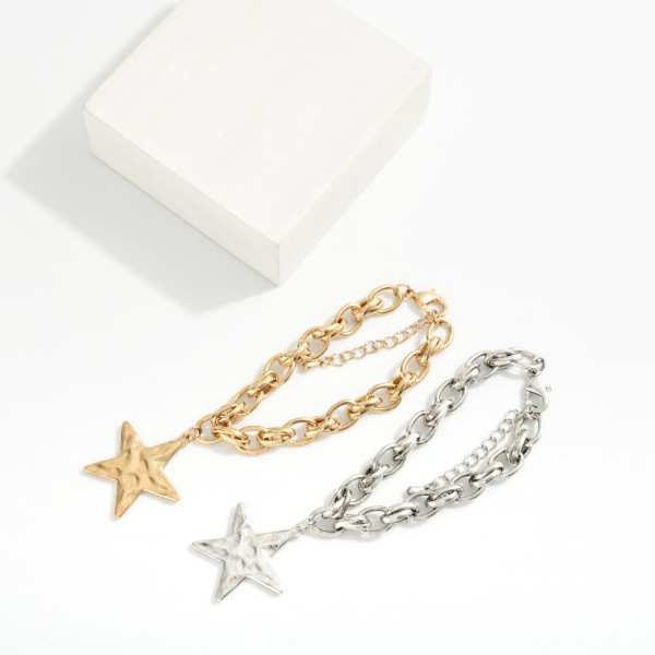 Double Link Chain Link Bracelet Featuring Hammered Metal Star Charm 

- Approximately 3" D
- Extender 2" L