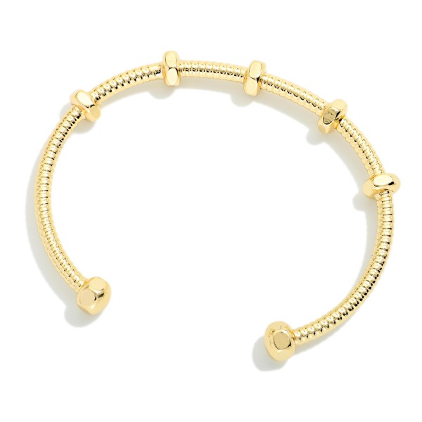 Ribbed Metal Tone Cuff Bracelet With Screw Nut Stations 

- Approximately 2.25" D