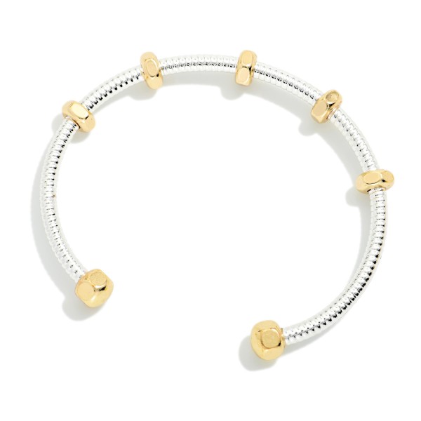 Ribbed Metal Tone Cuff Bracelet With Screw Nut Stations 

- Approximately 2.25" D