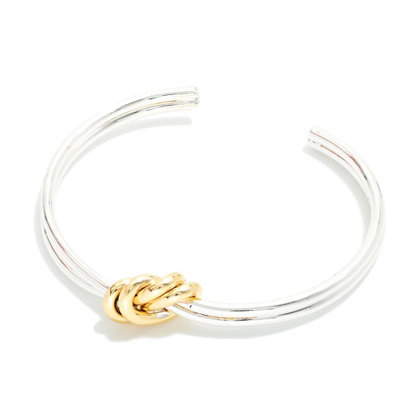 Metal Tone Cuff Bracelet Featuring Knot Detail 

- Approximately 2.5" D 