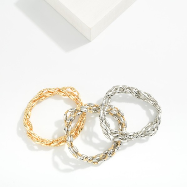 Set Of Four Metal Tone Cylinder Bead Beaded Stretch Bracelets 

- Approximately 2.5" D